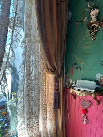 treatment room with lace curtains